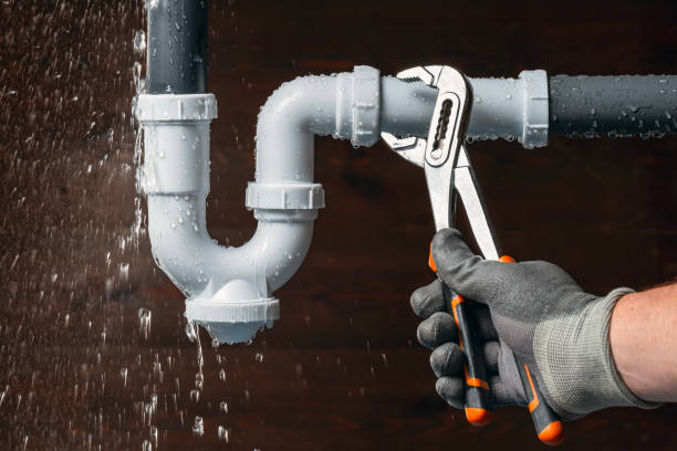 Professional Plumber technician working in Perryopolis, PA